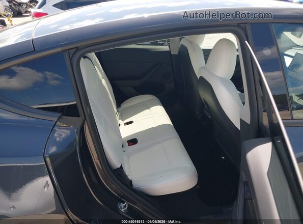 7SAYGDEF0RF048733 2024 TESLA MODEL Y Gray VIN sticker view