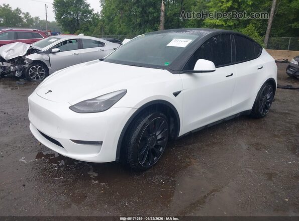 7SAYGDEF1NF534512 2022 TESLA MODEL Y White წინა მარცხენა ხედი სამი მეოთხედიდან