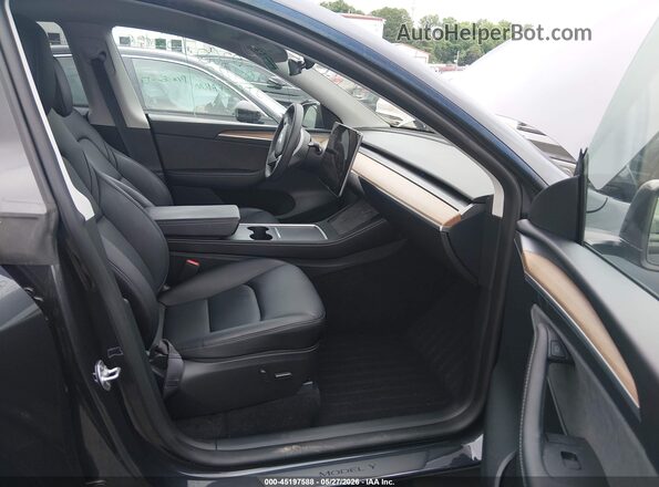 7SAYGDEF1RF034906 2024 TESLA MODEL Y Gray Front interior view