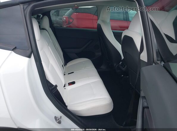 7SAYGDEF3PF695026 2023 TESLA MODEL Y White VIN კოდის სტიკერის ხედი