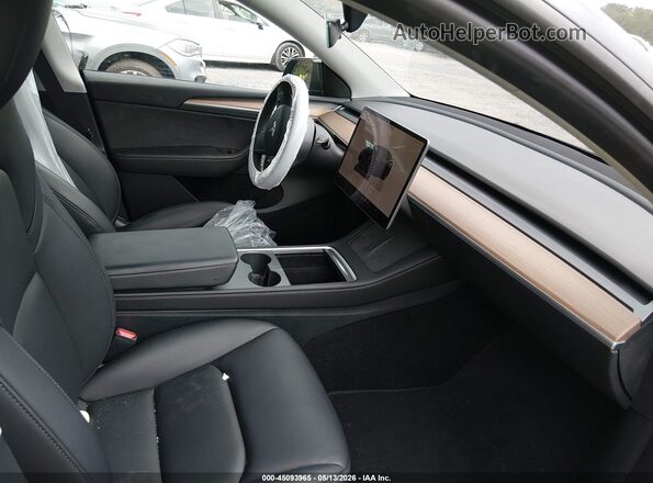 7SAYGDEF3PF825404 2023 TESLA MODEL Y Black Вид салону спереду