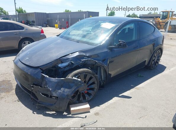 7SAYGDEF3RF020778 2024 TESLA MODEL Y Dark Blue Przód lewy