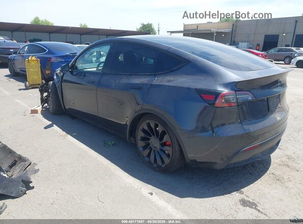 7SAYGDEF3RF020778 2024 TESLA MODEL Y Dark Blue Tył lewy