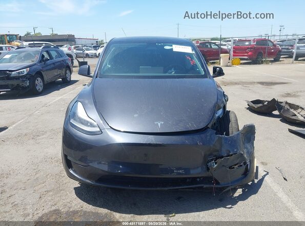 7SAYGDEF3RF020778 2024 TESLA MODEL Y Dark Blue Widok wnętrza z tyłu