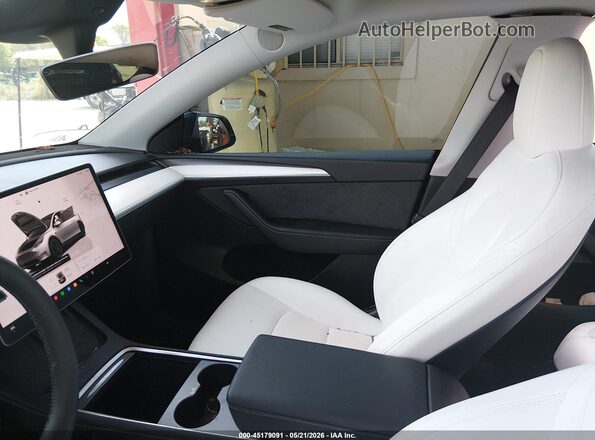 7SAYGDEF4RF029389 2024 TESLA MODEL Y Черный Вид салона спереди