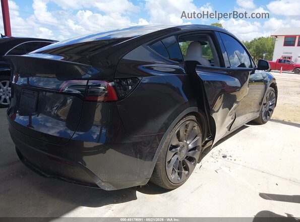 7SAYGDEF4RF029389 2024 TESLA MODEL Y Черный Вид панели приборов