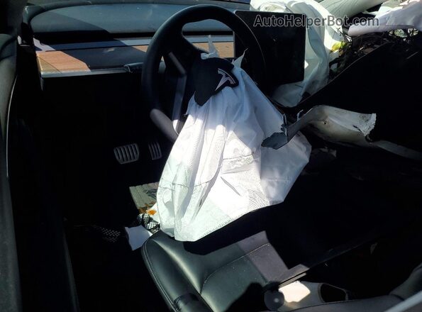 7SAYGDEF4SF216539 2025 TESLA MODEL Белый Вид панели приборов