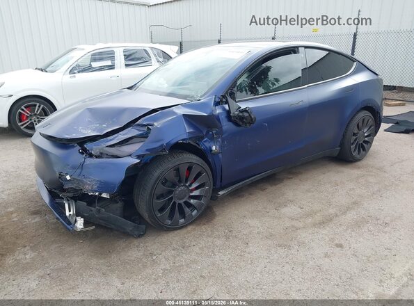 7SAYGDEF5PF621302 2023 TESLA MODEL Y Blue წინა მარცხენა ხედი სამი მეოთხედიდან