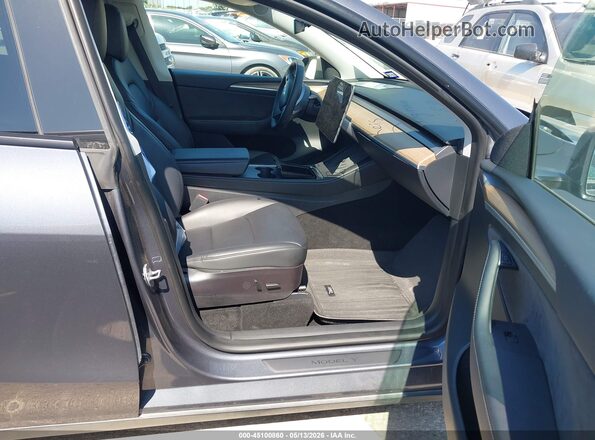 7SAYGDEF5PF668944 2023 TESLA MODEL Y Blue Vista interior delantera