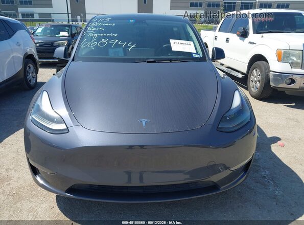 7SAYGDEF5PF668944 2023 TESLA MODEL Y Blue Vista interior trasera