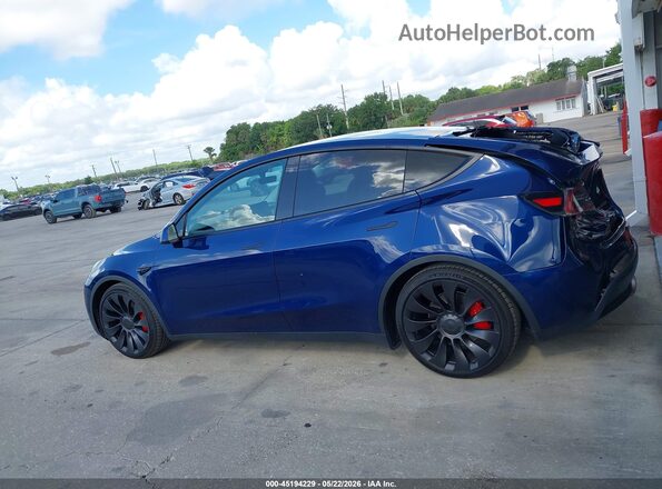 7SAYGDEF6NF382419 2022 TESLA MODEL Y Blue Вид задньої частини салону