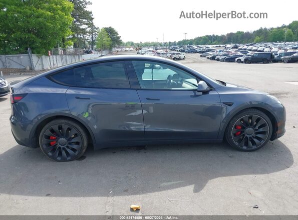 7SAYGDEF6NF533677 2022 TESLA MODEL Y Gray Սալոնի հետևի տեսք