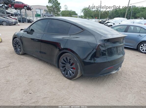 7SAYGDEF6RA304094 2024 TESLA MODEL Y Black უკანა მარცხენა