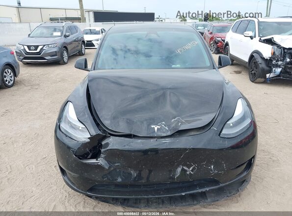 7SAYGDEF6RA304094 2024 TESLA MODEL Y Black წინა ხედი