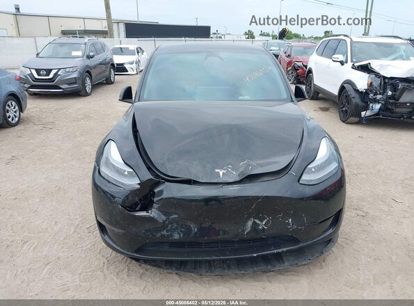 7SAYGDEF6RA304094 2024 TESLA MODEL Y Black ხელსაწყოთა პანელის ხედი