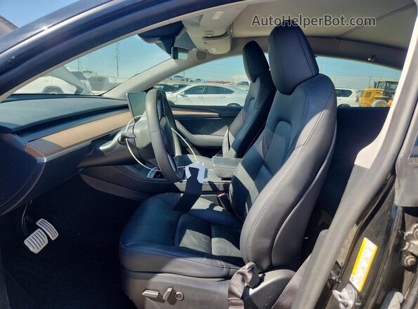7SAYGDEF7RF037406 2024 TESLA MODEL Черный Вид салона спереди