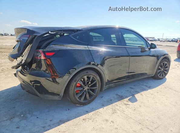 7SAYGDEF7RF037406 2024 TESLA MODEL Черный Задняя правая четверть