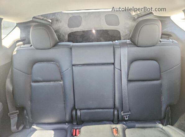 7SAYGDEF9PF793574 2023 TESLA MODEL White Vista de los asientos traseros