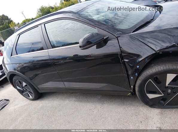 7YAKN4DA7SY039184 2025 HYUNDAI IONIQ 5 Black Սալոնի հետևի տեսք