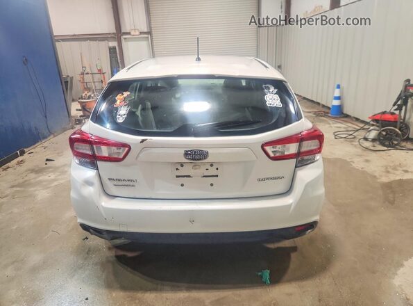 4S3GTAA65K3759548 2019 SUBARU IMPREZA White Front interior view