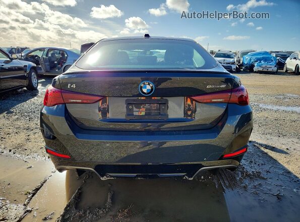 WBY23HD03SFV64510 2025 BMW I4 Gray Вид салону спереду