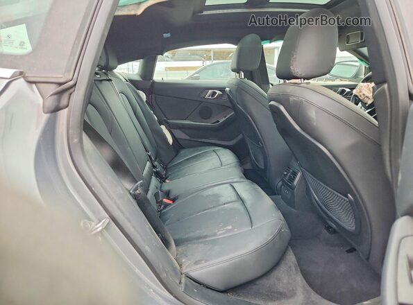 WBA53AK04R7N49900 2024 BMW 2 SERIES Gray Vista interior trasera