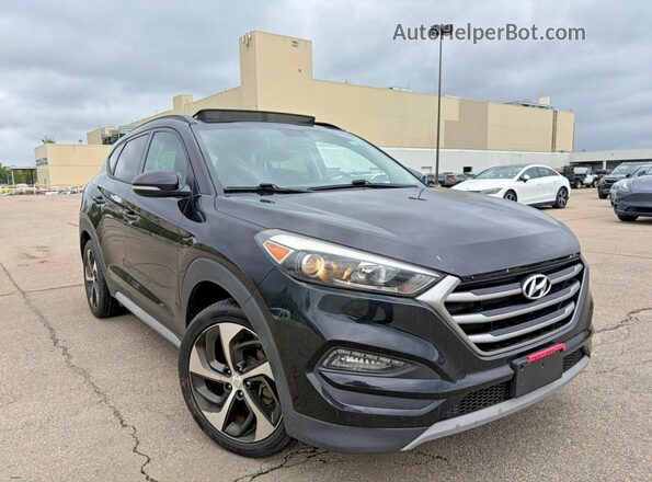 KM8J3CA2XJU794296 2018 HYUNDAI TUCSON Black 