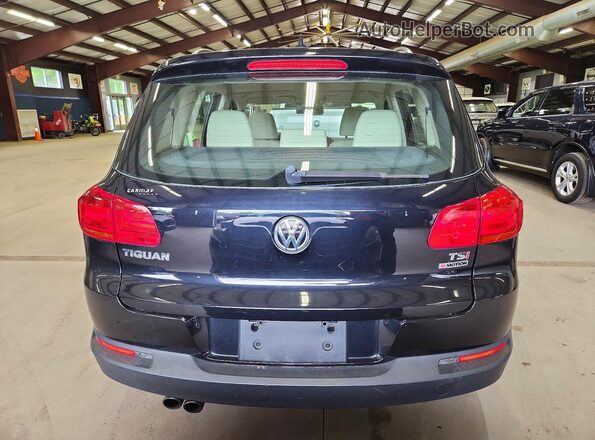 WVGBV7AXXHK000324 2017 VOLKSWAGEN TIGUAN Черный Вид салона спереди