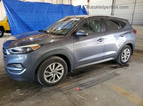 KM8J33A47GU207420 2016 HYUNDAI TUCSON Gray 