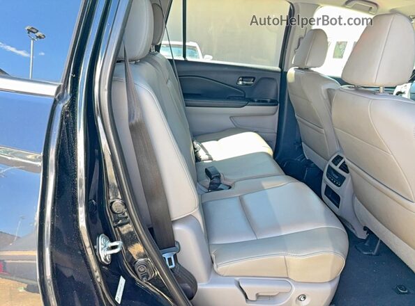 5FNYF5H50GB011087 2016 HONDA PILOT Черный Вид салона спереди