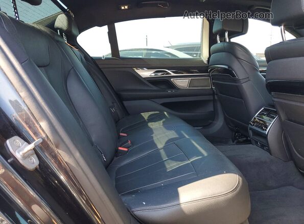 WBA7E4C51KGV28667 2019 BMW 7 SERIES Gray Вид задньої частини салону