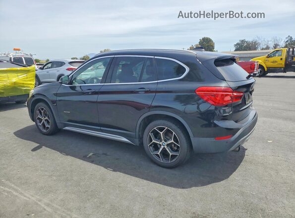 WBXHT3Z37H4A56438 2017 BMW X1 Black Trasero derecho