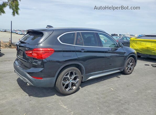 WBXHT3Z37H4A56438 2017 BMW X1 Black Delantero derecho