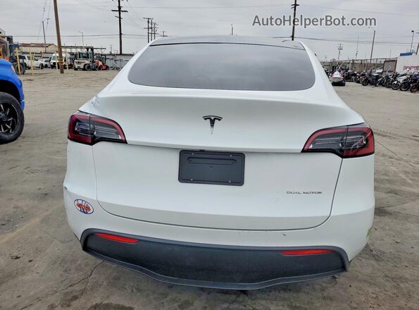7SAYGAEEXPF742736 2023 TESLA MODEL White Front interior view