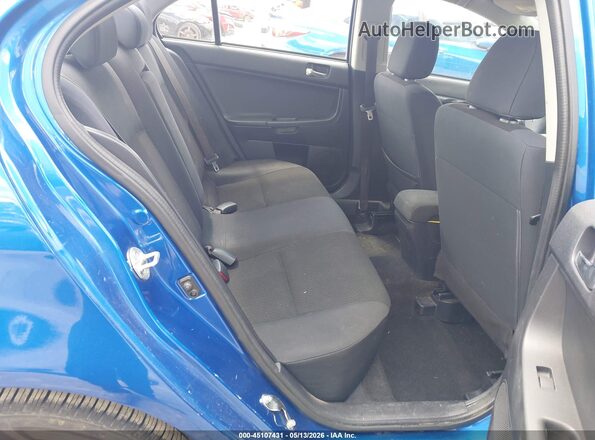JA32U2FU6HU009100 2017 MITSUBISHI LANCER Blue Вид наклейки з VIN-кодом