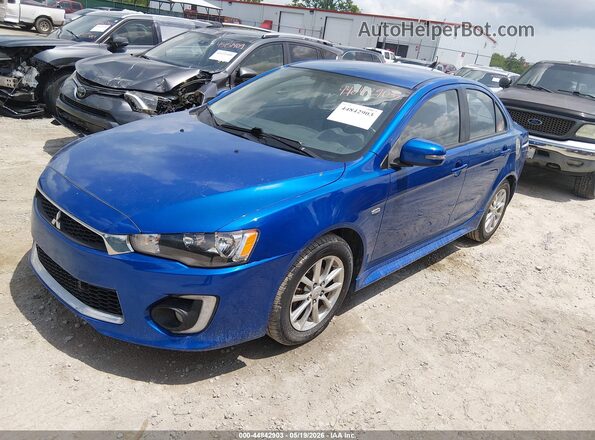 JA32U2FU7GU000694 2016 MITSUBISHI LANCER Синий Передняя левая четверть