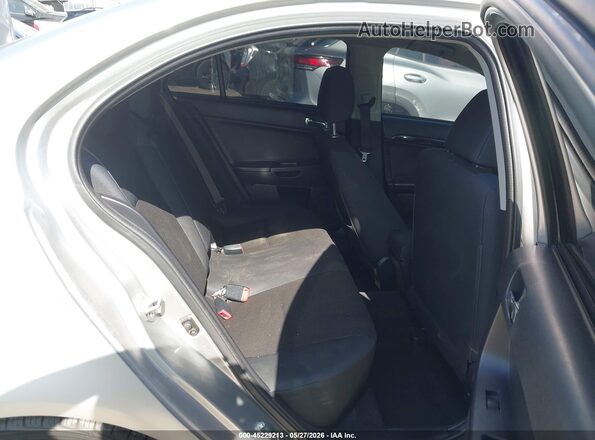JA32U2FU7GU007841 2016 MITSUBISHI LANCER Silver Widok naklejki z numerem VIN