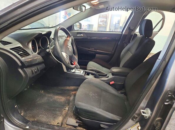 JA32U2FUXGU010586 2016 MITSUBISHI LANCER Gray Widok wnętrza z przodu