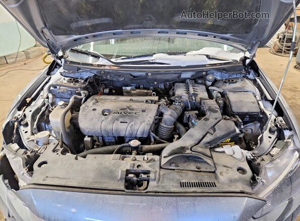 JA32U2FUXGU010586 2016 MITSUBISHI LANCER Gray Widok wnętrza z tyłu