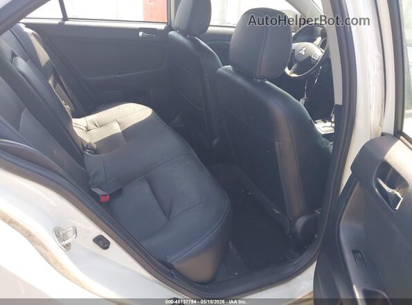 JA32V2FW0GU003211 2016 MITSUBISHI LANCER White Widok naklejki z numerem VIN