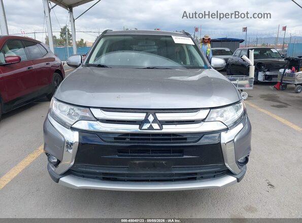 JA4AD3A38GZ052706 2016 MITSUBISHI OUTLANDER Gray ხელსაწყოთა პანელის ხედი