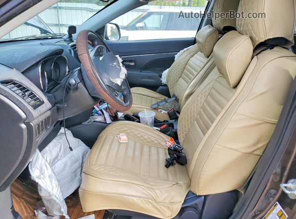 JA4AP3AU9LU011217 2020 MITSUBISHI OUTLANDER Brown Vista interior delantera
