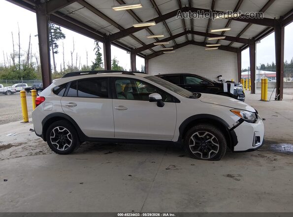 JF2GPAKC2GH302989 2016 SUBARU CROSSTREK White Rear interior view