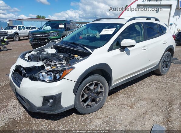 JF2GTACC1K8325344 2019 SUBARU CROSSTREK White Vista tres cuartos delantera izquierda
