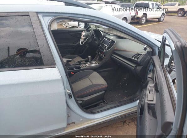 JF2GTAEC0NH259970 2022 SUBARU CROSSTREK Light Blue Widok wnętrza z przodu