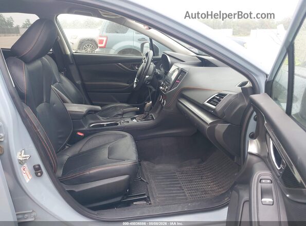 JF2GTAJC2JH280965 2018 SUBARU CROSSTREK Light Blue Widok wnętrza z przodu