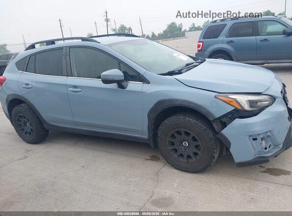 JF2GTAJC2JH280965 2018 SUBARU CROSSTREK Light Blue Widok wnętrza z tyłu