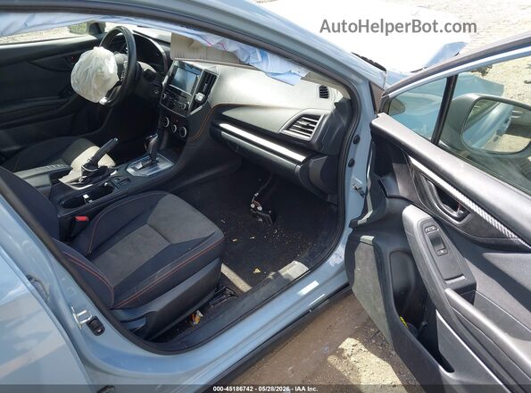 JF2GTAPC7N8214960 2022 SUBARU CROSSTREK Light Blue Вид салона спереди