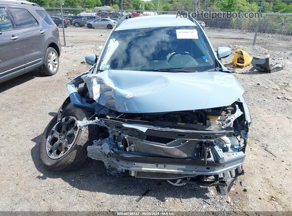 JF2GTAPC7N8214960 2022 SUBARU CROSSTREK Light Blue Вид задней части салона
