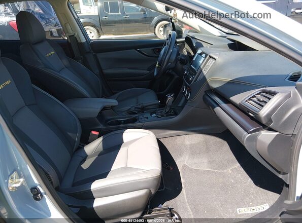 JF2GTHRC6MH664068 2021 SUBARU CROSSTREK Light Blue წინა სალონის ხედი
